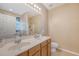 Well-lit bathroom with double sink vanity, and neutral colors with a separate toilet area, and shower at 139 Gaslight Blvd, Summerville, SC 29483