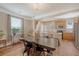Open-concept dining area flowing into a modern kitchen with stainless steel appliances at 139 Gaslight Blvd, Summerville, SC 29483