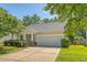 Charming single-story home with a well-maintained lawn, driveway, and two-car garage at 139 Gaslight Blvd, Summerville, SC 29483