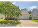 Inviting home with lush landscaping, a two-car garage, and a well-manicured front yard at 139 Gaslight Blvd, Summerville, SC 29483