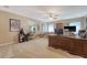 This spacious living area has carpeted floors, warm neutral colors, and plenty of room for furniture and activities at 139 Gaslight Blvd, Summerville, SC 29483