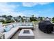 Relaxing back deck with comfortable seating, outdoor grill, and fantastic neighborhood views at 1464 Stratton Pl, Mount Pleasant, SC 29466