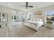 Spacious bedroom with a comfortable king bed, plush carpeting, and an attached sunroom at 1464 Stratton Pl, Mount Pleasant, SC 29466