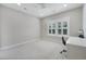 Bright bedroom with neutral walls, white trim, a ceiling fan, and natural light from the window at 1464 Stratton Pl, Mount Pleasant, SC 29466