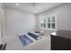 Bright bedroom with a ceiling fan, a window with shutters and space for exercise at 1464 Stratton Pl, Mount Pleasant, SC 29466