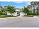 Beautiful clubhouse with modern architectural design surrounded by mature trees at 1464 Stratton Pl, Mount Pleasant, SC 29466