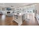 Open concept kitchen with large center island, stainless steel appliances and hardwood flooring at 1464 Stratton Pl, Mount Pleasant, SC 29466
