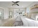 Bright and airy main bedroom with a cozy rug and an open sitting area with lots of sunlight at 1464 Stratton Pl, Mount Pleasant, SC 29466