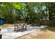 Outdoor backyard featuring bar stools, a dining table, and sitting area at 1515 N Lakeshore Dr, Mount Pleasant, SC 29466