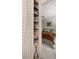 Bedroom with view of shelves with neatly folded towels and a brown fuzzy bed at 1515 N Lakeshore Dr, Mount Pleasant, SC 29466