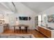 Well-lit dining area featuring hardwood floors and modern furnishings, creating an inviting atmosphere at 1515 N Lakeshore Dr, Mount Pleasant, SC 29466
