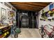 Organized garage with storage cabinets, tool racks, and space for bikes and equipment at 1515 N Lakeshore Dr, Mount Pleasant, SC 29466
