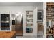 Kitchen featuring stainless steel appliances, hidden cabinet storage, and knife racks at 1515 N Lakeshore Dr, Mount Pleasant, SC 29466