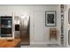 Kitchen with stainless steel appliances, double oven and hidden cabinet storage at 1515 N Lakeshore Dr, Mount Pleasant, SC 29466