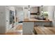 Modern kitchen with stainless steel appliances, sleek countertops, and stylish lighting fixtures, creating a functional and chic space at 1515 N Lakeshore Dr, Mount Pleasant, SC 29466