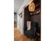 Cozy reading nook with comfortable chair, soft lighting, and view of hallway and bathroom at 1515 N Lakeshore Dr, Mount Pleasant, SC 29466