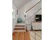 Cozy staircase with wooden stairs and a white railing leads to the upper level at 1515 N Lakeshore Dr, Mount Pleasant, SC 29466