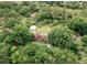 An aerial view of a home and property surrounded by trees at 1551 Hutton Pl, Charleston, SC 29407