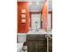 Bathroom with a rustic-style vanity, decorative wall art, and a mirrored wall cabinet at 1551 Hutton Pl, Charleston, SC 29407