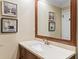Bathroom showcasing a large mirror, granite countertop, and well-crafted wooden vanity at 1551 Hutton Pl, Charleston, SC 29407
