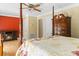 Spacious bedroom featuring a four-poster bed, fireplace, and classic wood furniture at 1551 Hutton Pl, Charleston, SC 29407