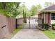 Gated driveway entrance with custom metal work at 1551 Hutton Pl, Charleston, SC 29407