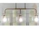 Close-up of modern pendant lighting over the kitchen island at 1551 Hutton Pl, Charleston, SC 29407