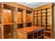 Gorgeous, large walk-in closet with custom shelving, hanging rods, and center island at 1551 Hutton Pl, Charleston, SC 29407