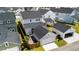An aerial view showcases the home with its detached garage, fenced yard, and nearby street at 1963 Longhorn Ln, Summerville, SC 29485