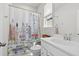 Clean bathroom featuring modern sink, toilet, and stylish shower curtain at 1963 Longhorn Ln, Summerville, SC 29485