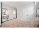 Bedroom featuring a four-poster bed, wood accents, and a double-door closet at 1963 Longhorn Ln, Summerville, SC 29485