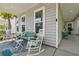 Inviting front porch with comfortable seating, perfect for enjoying the outdoors at 1963 Longhorn Ln, Summerville, SC 29485