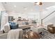 Open living area with a view of the staircase, kitchen and dining area at 1963 Longhorn Ln, Summerville, SC 29485