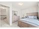 Comfortable bedroom with modern decor, a large dresser, and lots of natural light at 2050 S Smokerise Way, Mount Pleasant, SC 29466