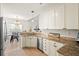 Bright kitchen with granite countertops, stainless steel appliances, and ample cabinet space at 2050 S Smokerise Way, Mount Pleasant, SC 29466