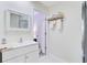 En-suite bathroom with vanity sink, white tile floor and standing shower at 2136 Kings Gate Ln, Mount Pleasant, SC 29466