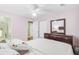 Bedroom boasts ceiling fan, closet and ensuite bathroom at 2136 Kings Gate Ln, Mount Pleasant, SC 29466