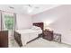 Cozy bedroom with pink walls and a ceiling fan with matching furniture at 2136 Kings Gate Ln, Mount Pleasant, SC 29466