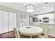 Dining area adjacent to kitchen with light fixture and seating for four with a view to kitchen at 2136 Kings Gate Ln, Mount Pleasant, SC 29466