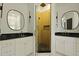 Bathroom featuring dual sinks, black countertop, and glass enclosed shower at 2258 Arthur Gaillard Ln, Charleston, SC 29414