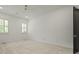 Bright bedroom with neutral carpet, three windows, recessed lighting and a closet door at 2258 Arthur Gaillard Ln, Charleston, SC 29414