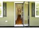 Inviting entryway showcasing gleaming hardwood floors and stylish pendant lighting, creating an elegant first impression at 2258 Arthur Gaillard Ln, Charleston, SC 29414