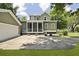 Two-story home with lush landscaping, long driveway, and detached garage at 2258 Arthur Gaillard Ln, Charleston, SC 29414