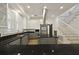 Bright kitchen featuring modern appliances, granite countertops and staircase at 2258 Arthur Gaillard Ln, Charleston, SC 29414