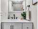 Clean, updated bathroom with a sleek vanity, modern fixtures, and a well-lit mirror at 2362 Parsonage Rd # 2H, Charleston, SC 29414