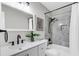 Modern bathroom featuring hexagon tile, updated vanity and black fixtures; bright and clean space at 2362 Parsonage Rd # 2H, Charleston, SC 29414