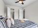 Well-lit bedroom featuring neutral colors, walk-in closet, and connected bath at 2362 Parsonage Rd # 2H, Charleston, SC 29414