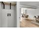Inviting dining area with wood floors, a modern light fixture, and views to kitchen and adjacent living space at 2362 Parsonage Rd # 2H, Charleston, SC 29414