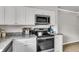 Bright kitchen featuring stainless steel appliances and light countertops and cabinets at 2362 Parsonage Rd # 2H, Charleston, SC 29414