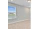 Neutral bedroom with a window overlooking a lake and a wall to wall carpet at 240 Lucca Dr, Summerville, SC 29486
